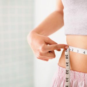 woman-measuring-her-waist